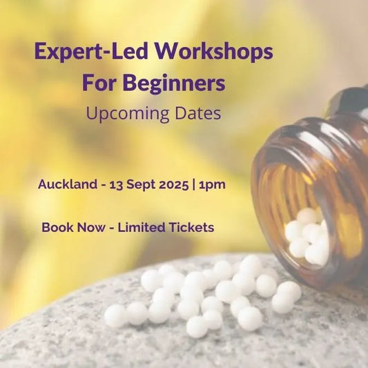 Advertisement for homeopathy workshops with homeopathic pills and a blurred yellow background